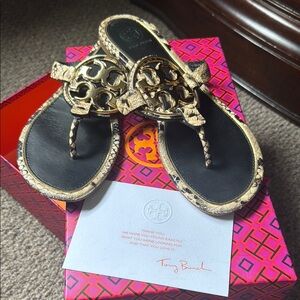 Tory Burch Gold and Black Sandals with Chic Design